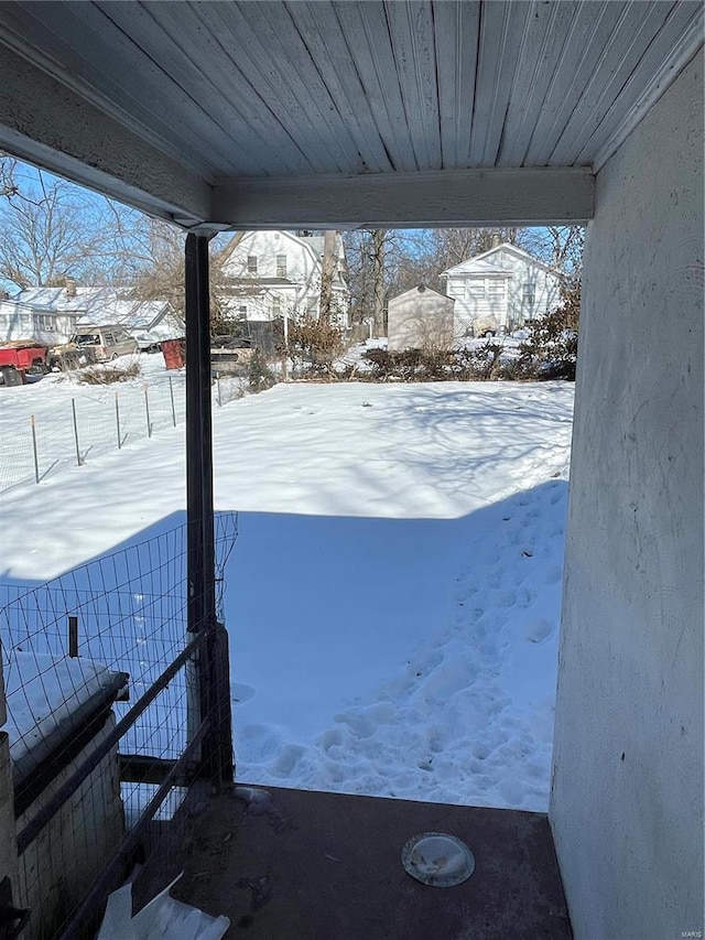 view of yard covered in snow