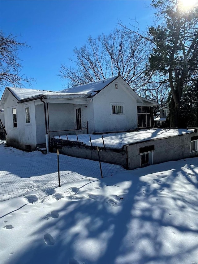 view of snow covered property