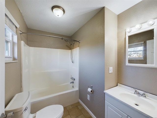 full bathroom featuring shower / washtub combination, vanity, toilet, tile patterned floors, and a textured ceiling