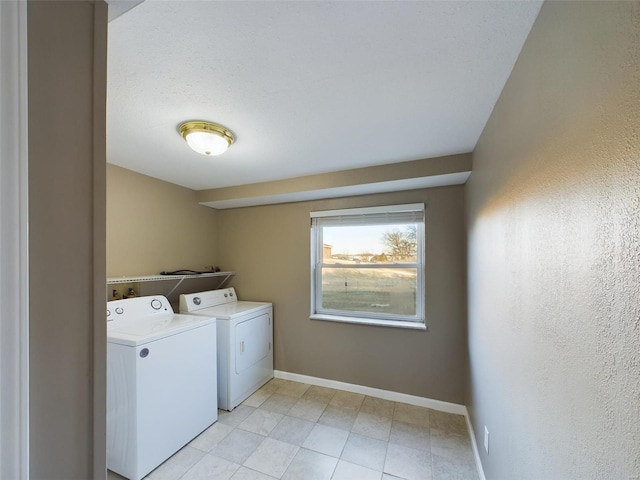 laundry area featuring independent washer and dryer