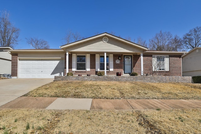 single story home featuring a porch, concrete driveway, a garage, and brick siding