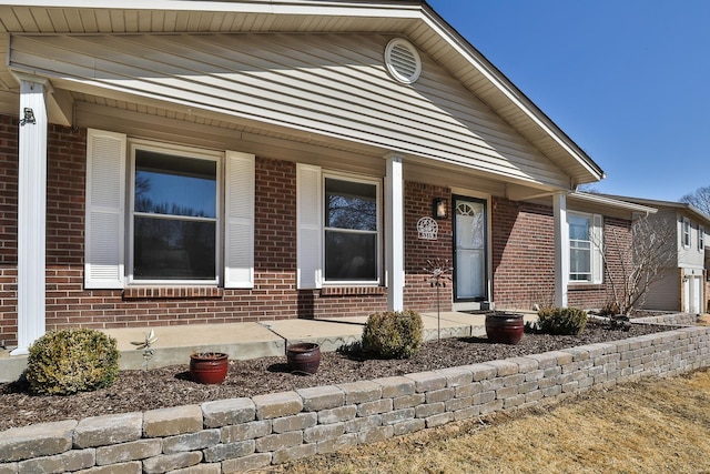 view of front facade featuring brick siding