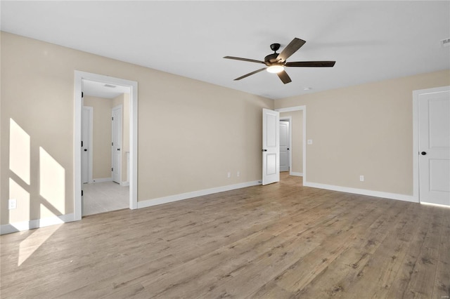 interior space with ceiling fan and light hardwood / wood-style floors