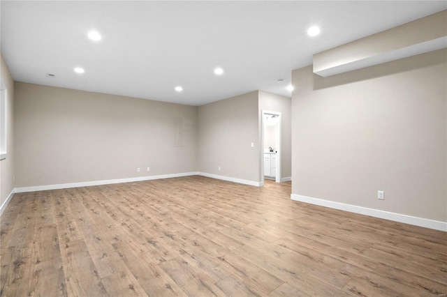 spare room featuring light hardwood / wood-style flooring