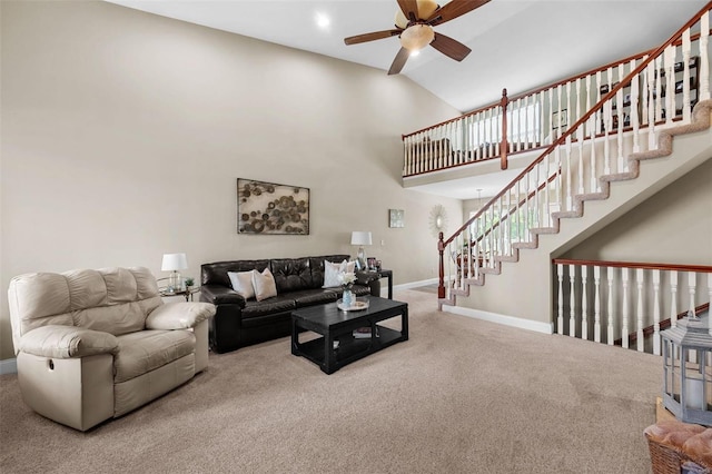 living room with ceiling fan, carpet flooring, and high vaulted ceiling