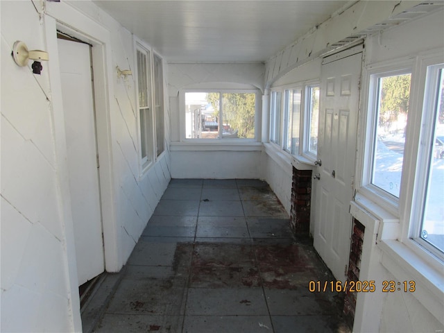 view of unfurnished sunroom