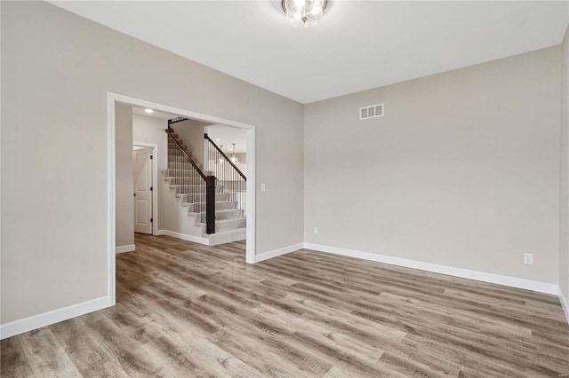 empty room with light wood-type flooring