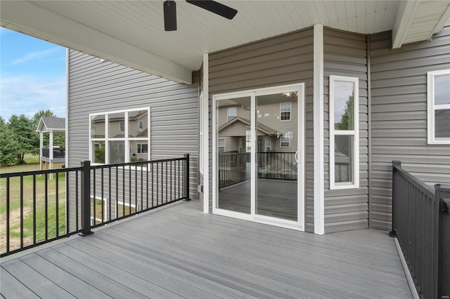 wooden deck with ceiling fan