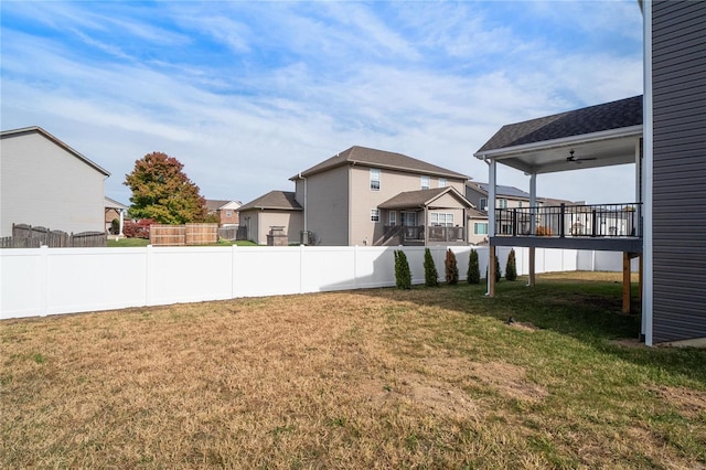 view of yard with ceiling fan