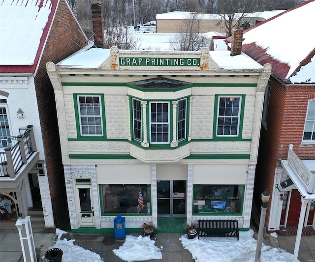 view of snow covered property