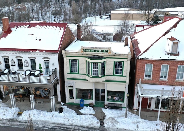 view of snow covered building