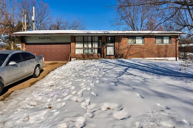 ranch-style house featuring a garage