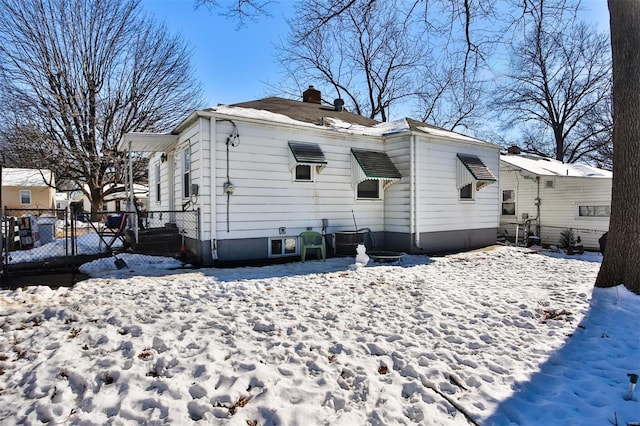 view of snow covered house