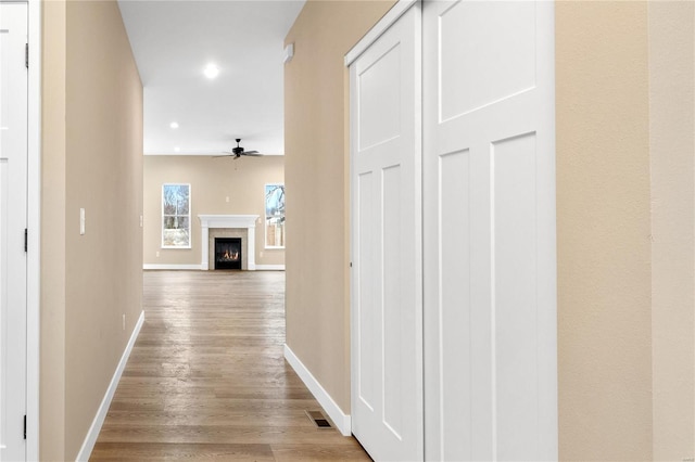 hall featuring light wood-type flooring