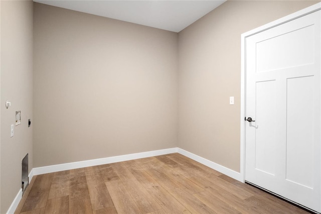 spare room featuring light hardwood / wood-style floors