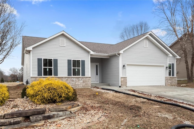 ranch-style house featuring a garage