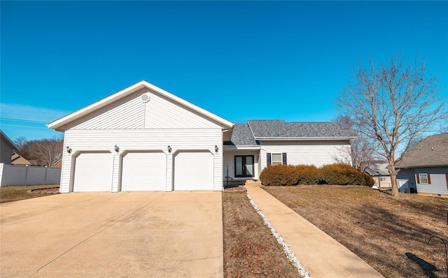 ranch-style house featuring a garage