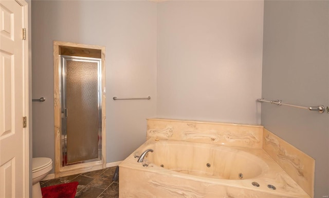 bathroom featuring separate shower and tub and toilet