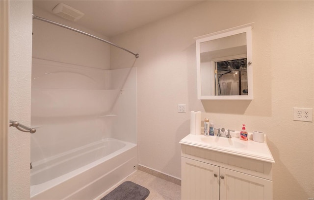 bathroom with bathtub / shower combination, tile patterned floors, and vanity