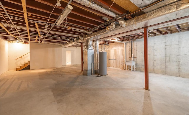 basement with sink and water heater