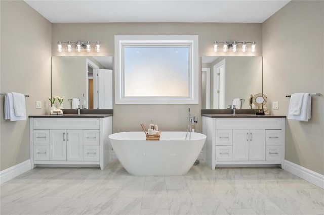 bathroom featuring a bathing tub and vanity