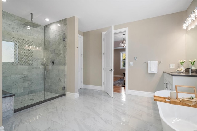 bathroom featuring vanity and plus walk in shower