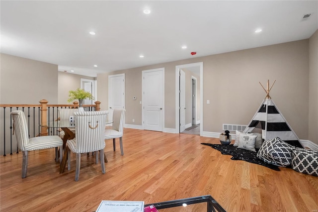 dining room featuring light hardwood / wood-style flooring