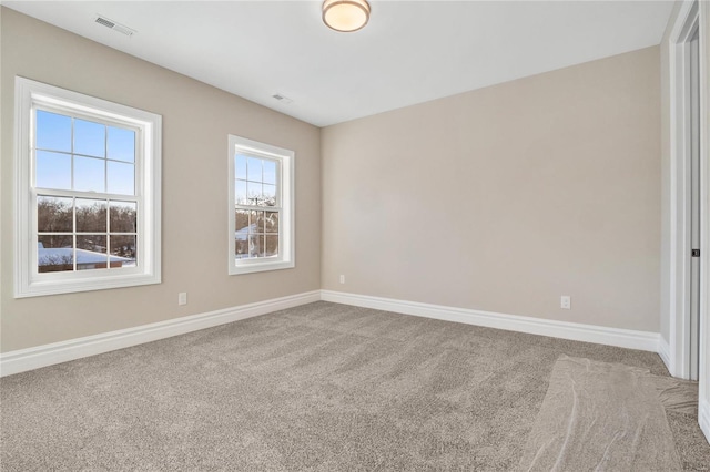 view of carpeted spare room