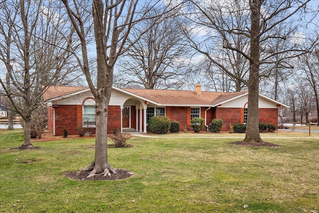 ranch-style house with a front yard