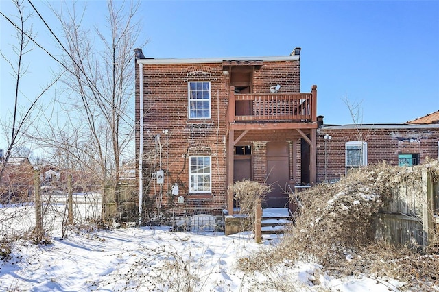 view of front facade featuring brick siding