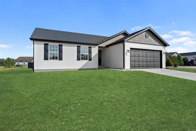 view of front facade with a front lawn and a garage