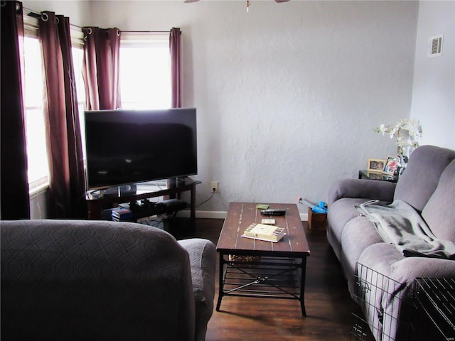 living room with dark hardwood / wood-style floors