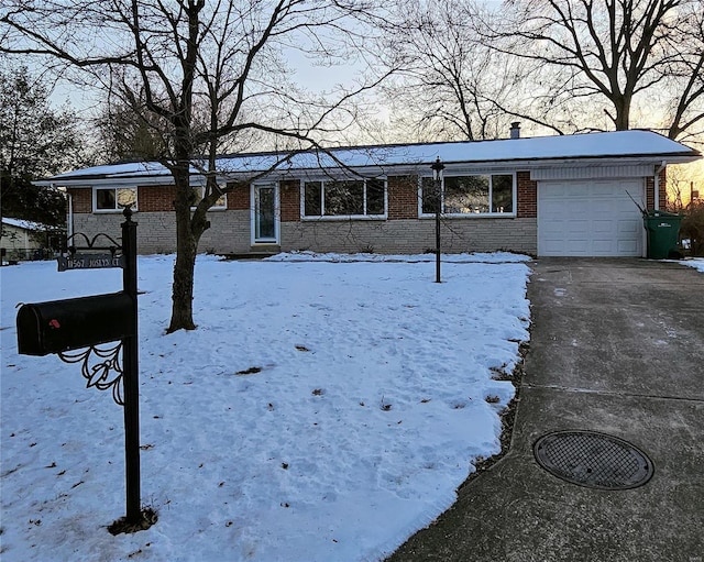 ranch-style home with a garage