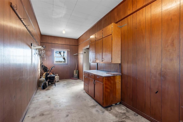 kitchen with wood walls