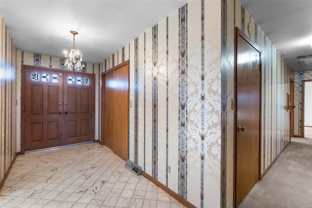 interior space with an inviting chandelier