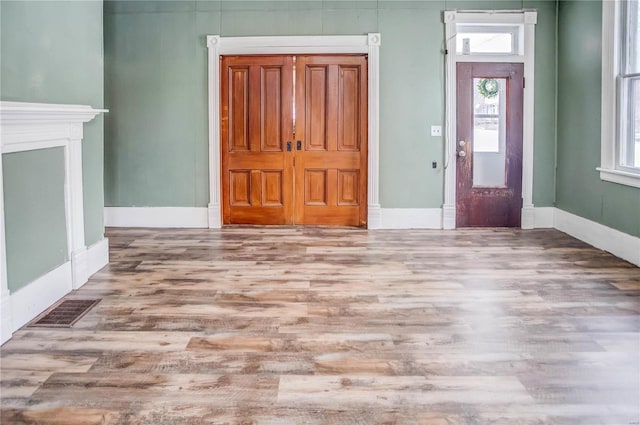 foyer featuring light wood-type flooring