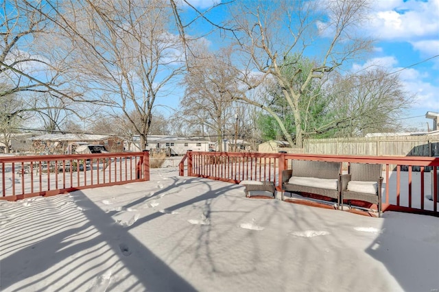 wooden terrace with a patio