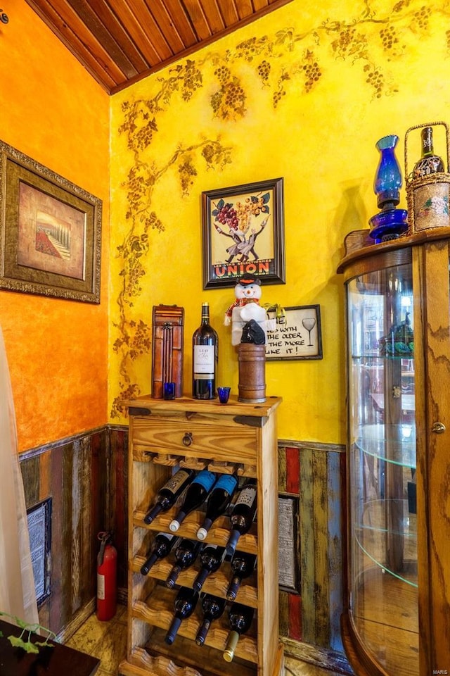 wine cellar with wood walls and wooden ceiling