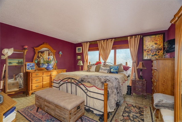 bedroom featuring a textured ceiling