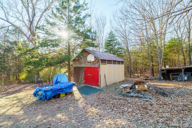 exterior space with a storage shed