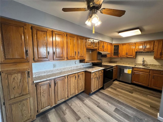 kitchen featuring ceiling fan, stainless steel dishwasher, sink, range with electric stovetop, and dark wood-type flooring