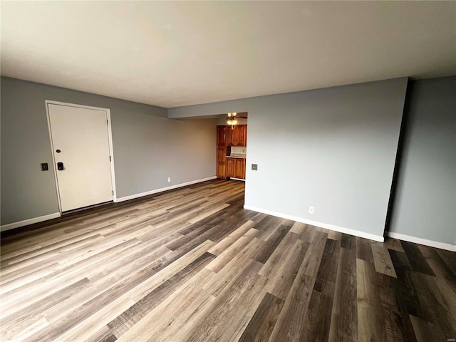 unfurnished living room featuring light hardwood / wood-style floors