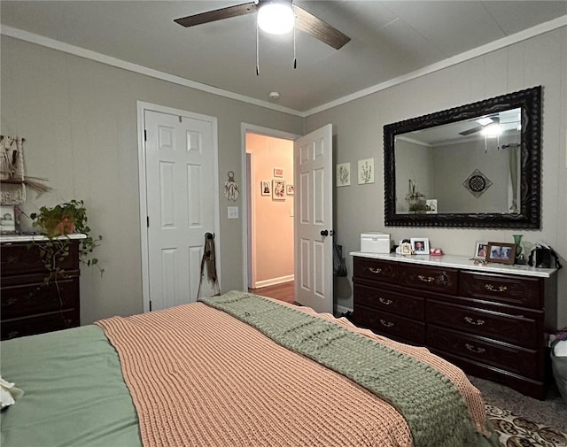 bedroom featuring ceiling fan and crown molding