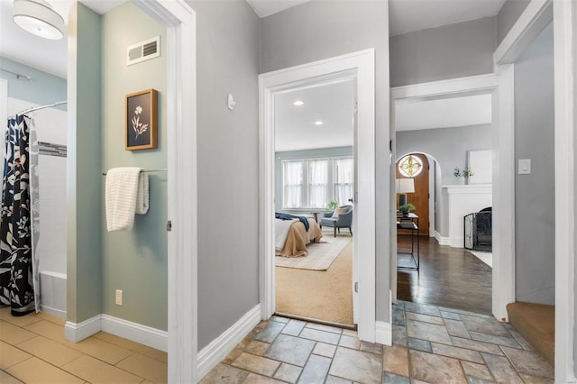 interior space with shower / bathtub combination with curtain