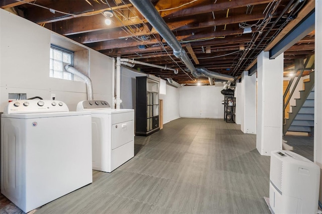 basement featuring separate washer and dryer