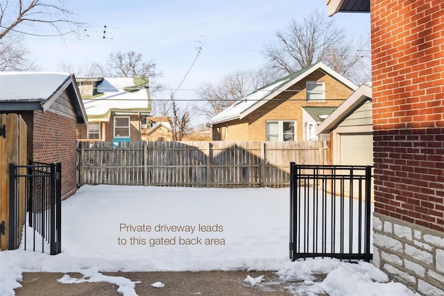 view of yard layered in snow