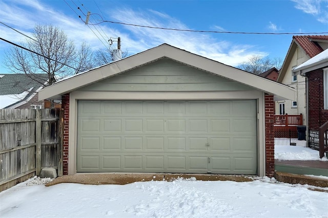 view of snow covered garage