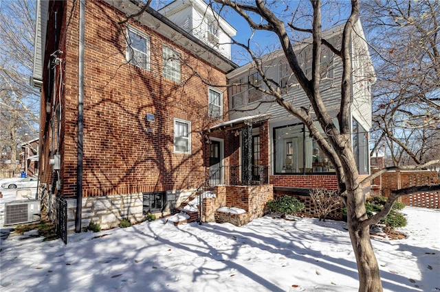 view of front of property with central AC unit