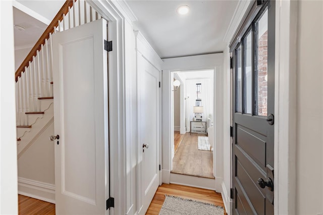 hallway with light wood-type flooring