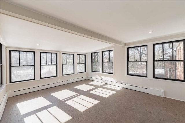 empty room with beamed ceiling